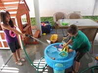 11-water_fun_playing_with_Tara_in_the_backyard