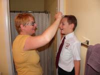 12-Mommy_getting_Kenny_ready_for_his_first_day_at_school_as_a_second_grader