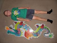 01-Kenny_and_large_dragon_puzzle_from_Donna_Higa-gift_from_friend_of_Daddy-very_neat_puzzle