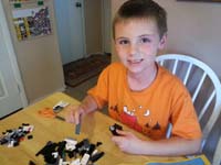 43-Mommy_bought_Kenny_a_new_Lego_to_build-again_to_make_Kenny_feel_better