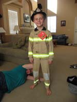 59-Mommy_helps_to_pull_down_the_legs-stretchy_suspenders_need_to_be_lengthened