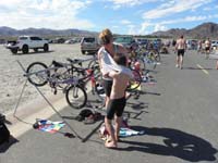 16-1008am-getting_help_from_Mommy_during_transition-putting_his_shirt_on