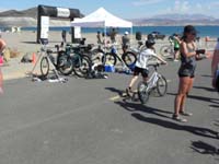 24-1025am-walking_his_bicycle_back_to_the_transition_area