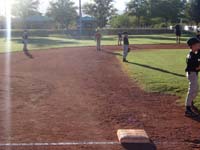 07-Kenny_on_second_base_ready_to_run