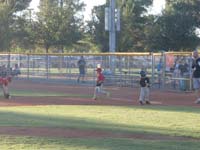 13-Kenny_catches_a_ground_ball-Daddy_wasn't_ready_for_the_shot