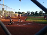 21-he_swings_and_hits_the_ball