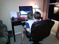 66-Kenny_sitting_with_Sierra_while_she_plays_a_game-dinner_at_the_Brewster's_house