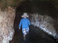 09-Kenny_walking_into_cave