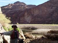 15-Poppy_at_entrance_looking_back_to_low_water_flow_for_Colorado_River-Sugarloaf_Mt_at_top_left