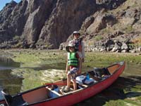 26-Kenny_and_Poppy_at_the_canoe_with_Gold_Strike_Canyon_in_background-HDR