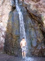 30-Kenny_puts_his_head_in_the_waterfall-with_a_little_coaxing
