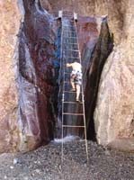 62-Kenny_climbing_down_the_ladder