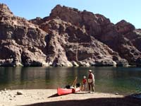72-Kenny_and_Poppy_with_canoe_at_mouth_of_Weeping_Springs_Cove