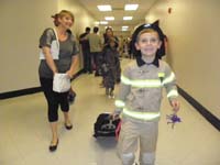 09-happy_Kenny_walking_through_the_halls_at_school