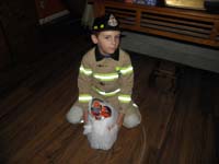 27-Kenny_and_his_big_stash-largest_pile_of_any_Halloween-this_was_a-good_year