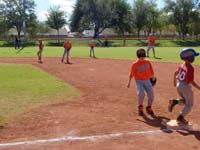 18-he_makes_it_to_second_base_because_the_first_baseman_went_for_the_play_at_first