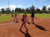 21-backing_up_Troy_at_first_base_while_playing_right_field