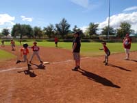22-backing_up_Troy_at_first_base_while_playing_right_field