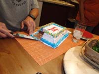 11-Kenny's_picture-Daddy_cutting_the_Carvel_ice_cream_cake