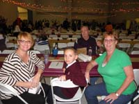 29-Mommy,Kenny,Grandpa_Duke_Grammy_visiting-big_cafeteria_with_lots_of_seats