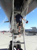 025-Kenny_climbing_into_the_cockpit_of_the_B1_bomber
