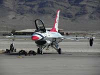 054-Thunderbird_with_support_crew_performing_some_pre-flight_exercise_on_the_tarmac