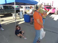 083-he_plays_with_the_toy_Thunderbird_plane_oblivious_to_the_amazing_Thunderbird_performance
