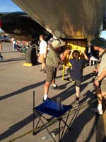116-B-25-Kenny_climbing_up_ladder_into_tail_section