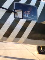 119-B-25-Daddy_and_Kenny_in_window_for_that_gun