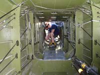 122-B-25-Kenny_fits_in_tight_space_easily-Daddy_joins_him_with_some_effort-wonder_what_like_during_combat