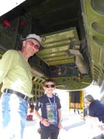 125-B-25-Poppy_and_Kenny_under_bombbay-waiting_to_climb_ladder_to_front,can't_use_that_crawl_space