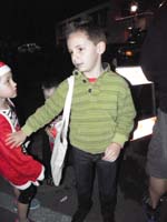 28-Daddy_got_a_bag_from_his_car_for_Kenny_to_collect_the_candy-it's_like_Halloween-even_eats_a_bunch