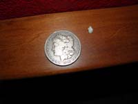 56-this_time_it_is_a_silver_dollar_from_1903-very_special_coin_for_special_tooth