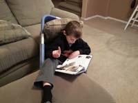 74-Kenny's_odd_way_of_reading_his_Civil_War_book_for_his_school_book_report