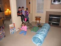 79-cold_outside_so_kids_played_inside_conducting_a_play_for_parents-Kenny,Sarina,Tara,Zoe