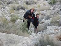 07-uh-oh_Kenny_is_hurt-he_decided_to_start_running_up_rocks_banging_his_knee_against_rock-needed_bandaid