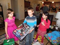 10-Kenny_was_happy_to_get_another_Lego_project-Leyna_and_Brooke_admire