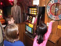25-kids_legally_playing_a_slot_machine