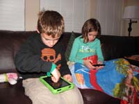32-Kenny_and_Leyna-the_way_this_generation_plays_together_when_relaxing_on_the_couch