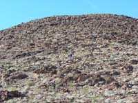 51-Jeff_and_Cristy_with_mountain_in_background-good_steep_mostly_solid_rock