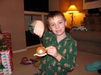 13-Kenny_is_happy_to_get_another_Christmas_ornament