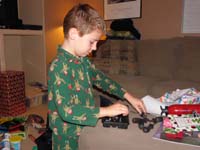 28-Kenny_opens_his_present_from_Daddy-with_tools-he_likes_to_play_with_tools_fixing_things
