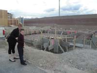 17-Mommy_and_Kenny_excited_to_see_framing_for_new_house