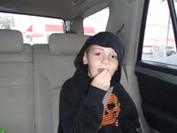 23-Kenny_pulls_and_twists_his_very_loose_front_tooth,but_it_won't_come_out