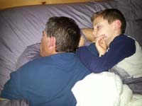 26-Kenny_all_curled_up_next_to_Daddy_while_sleeping-Kenny_likes_to_fall_asleep_in_our_bed