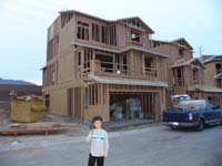 68-Kenny_at_new_house-wearing_helmet_since_visiting_construction_sight
