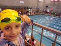 42-Kenny_gives_thumbs_up_while_waiting_with_family_in_stands-his_right_eye_droops