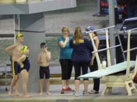 48-Mommy_talking_to_coach_about_possible_allergy-Kenny_wiggling_his_very_loose_front_tooth
