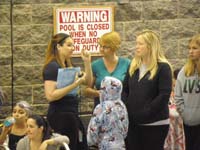 67-Mommy_and_Kenny_talking_with_Coach_Lindsey_learning_the_results_on_board_are_unofficial-don't_worry