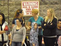 68-Kenny_in_his_robe_looking_across_the_pool_to_Daddy